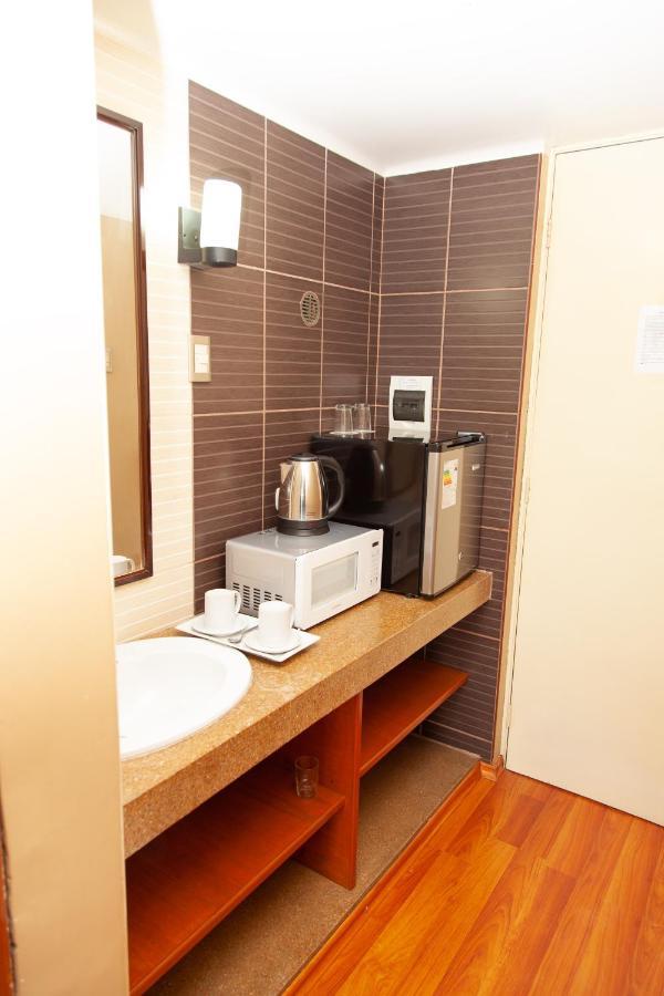 Holiday Suites Tacna Exterior photo