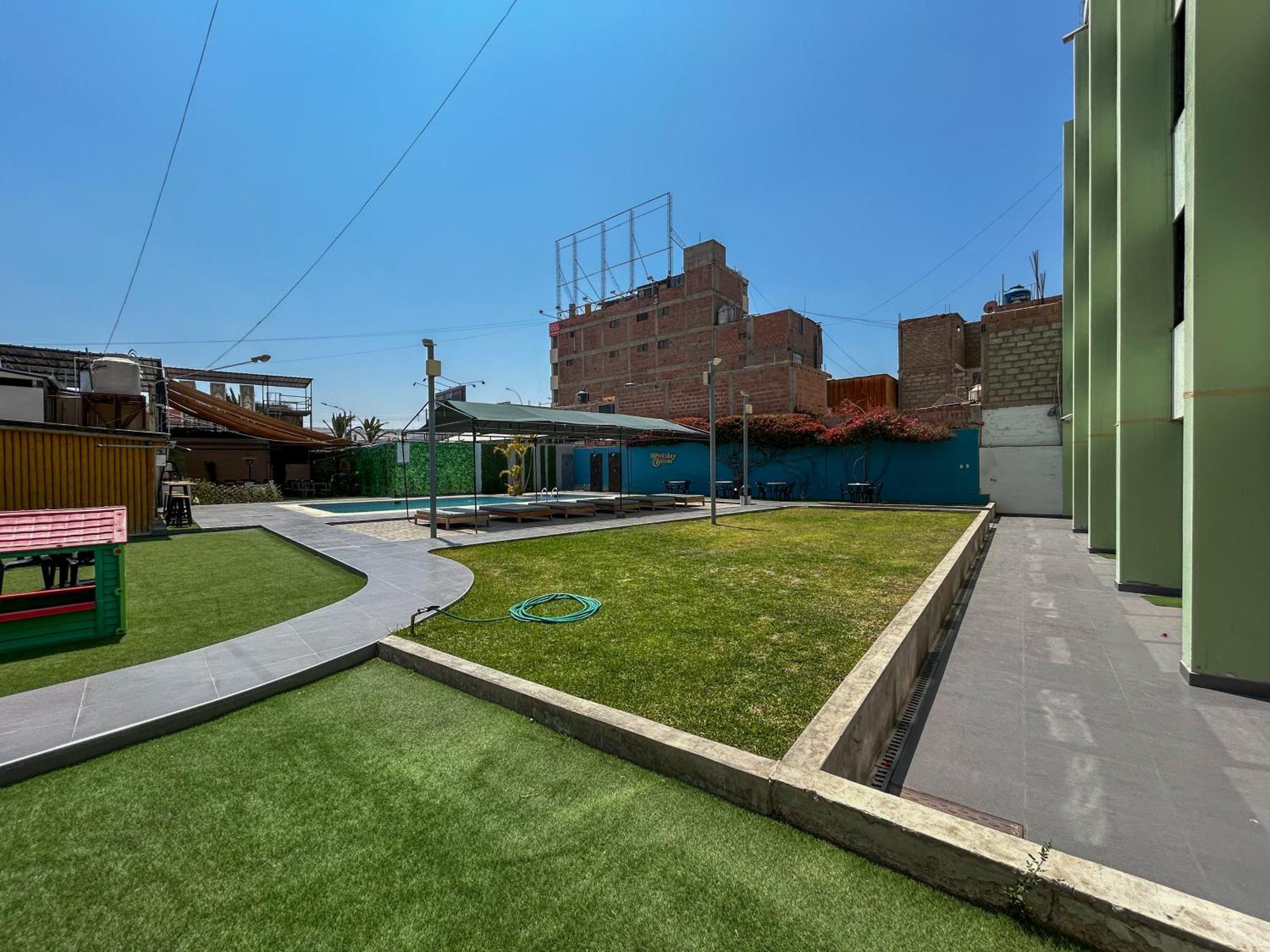 Holiday Suites Tacna Exterior photo
